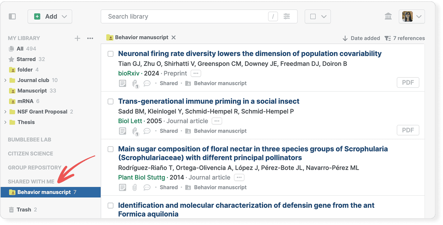 The library with a red arrow pointing to the “Shared with me” section of the sidebar and the “Behavior manuscript” folder selected, its seven references listed on the right.